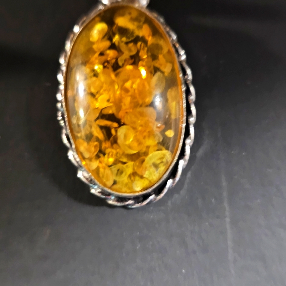 Amber pendant in silver setting